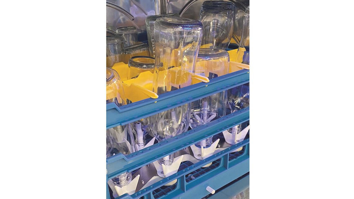 MEIKO bottle rack has washing and rinsing pipe inside the bottle