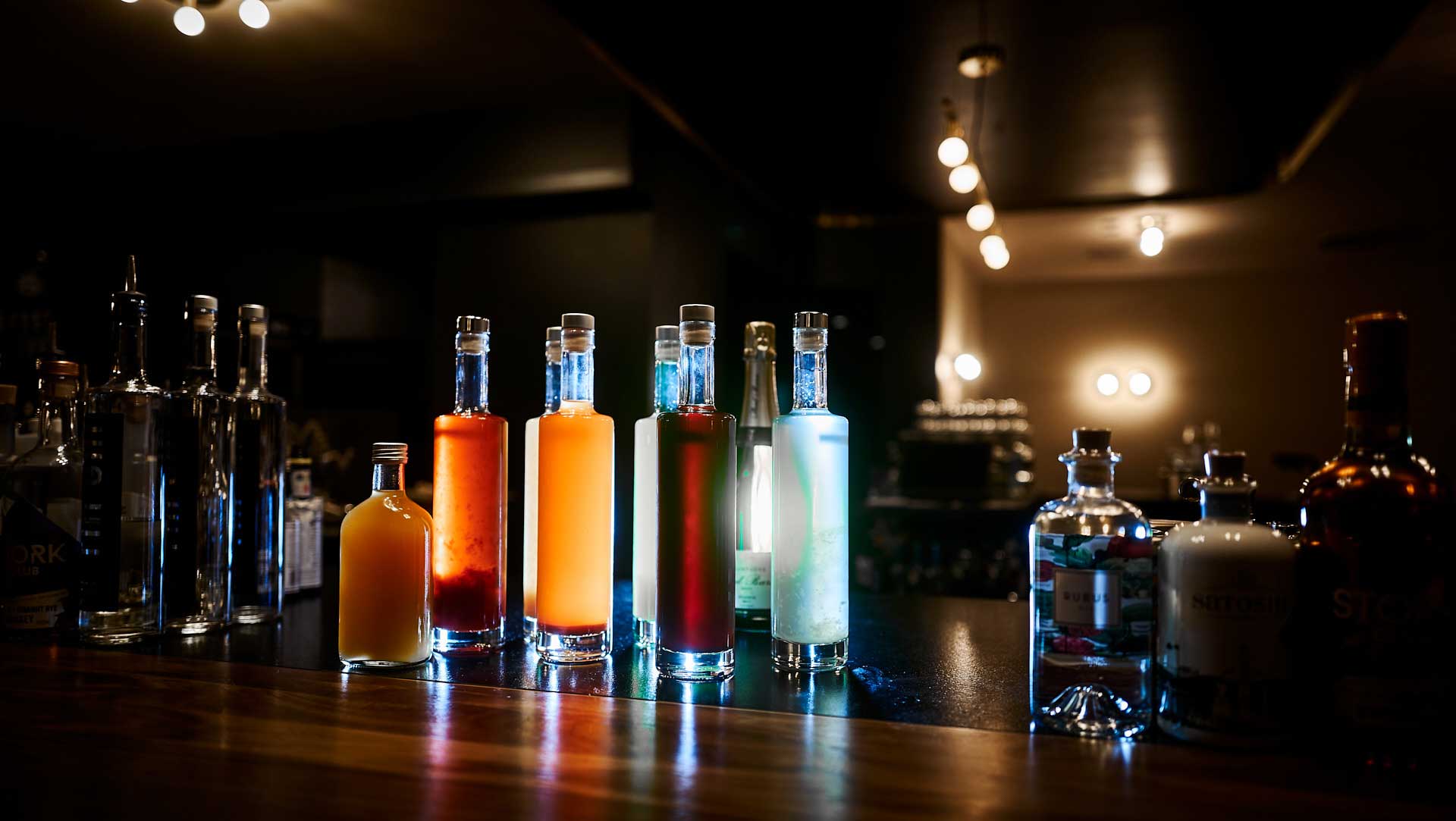Tin Tin bar serves cocktails in glass bottles
